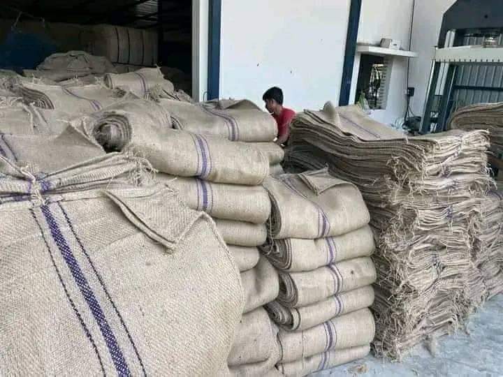 Stevepack warehouse — staff handling jute bag stock