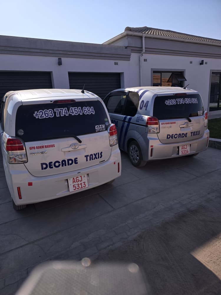 Decade Taxis — fleet parked on driveway